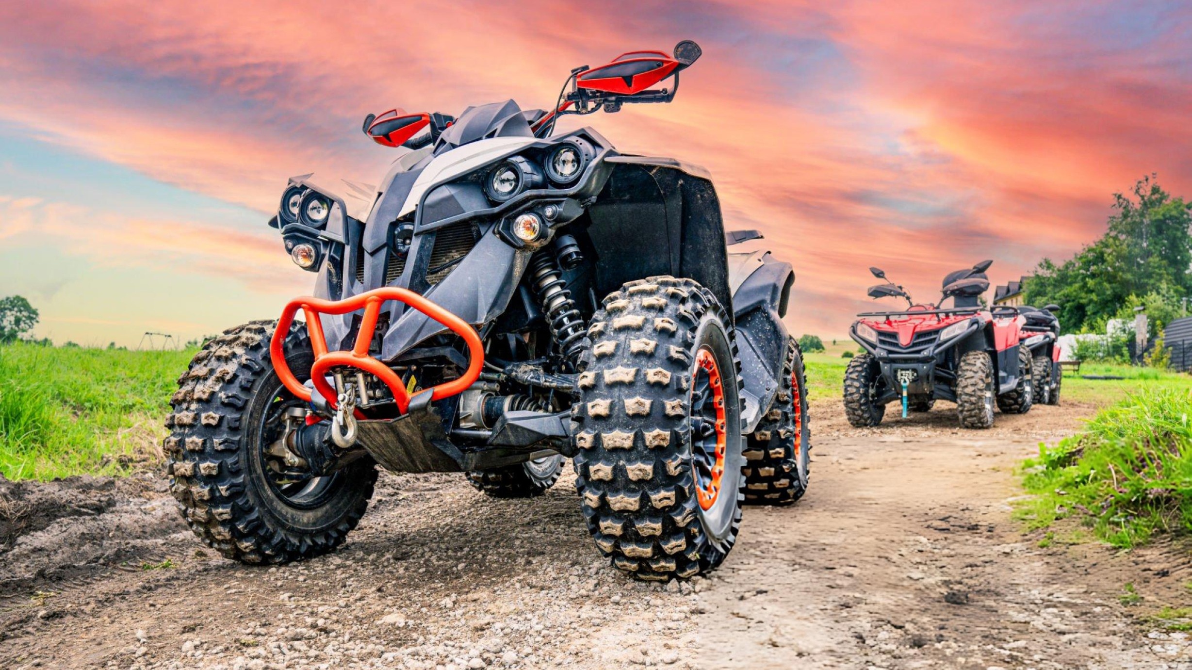 ATV quad bike and UTV side-by-side vehicle comparison on off-road trail