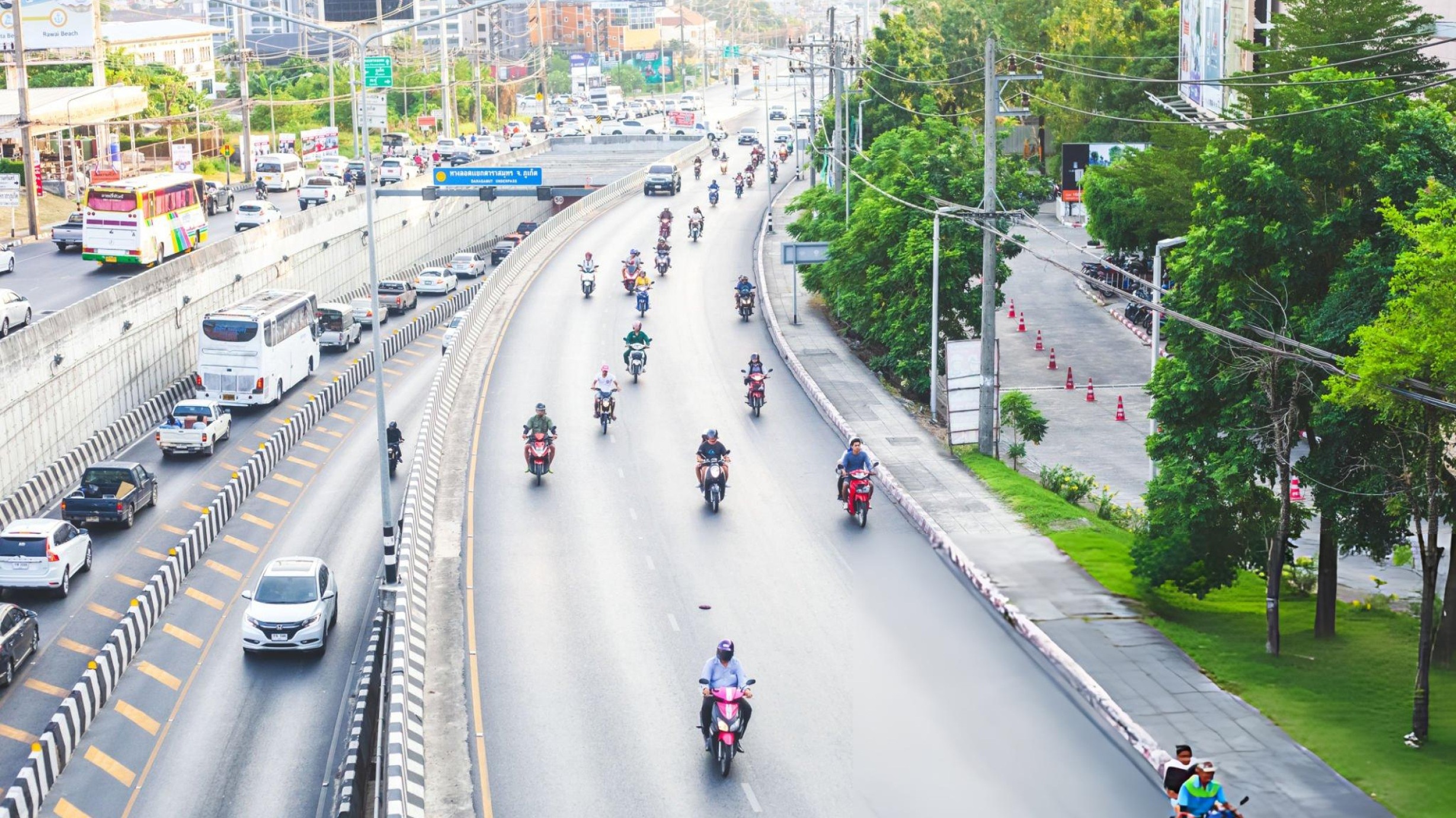 Dirt bike rider with insurance document showing coverage options and premium costs